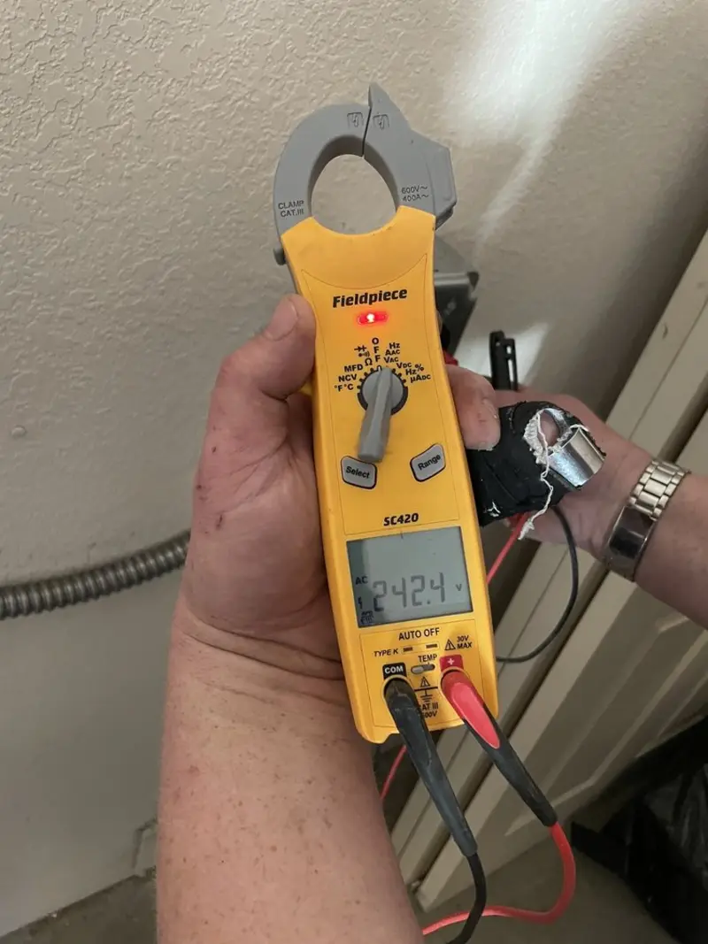Voltage testing with clamp meter during Generator Installation in Lochbuie
